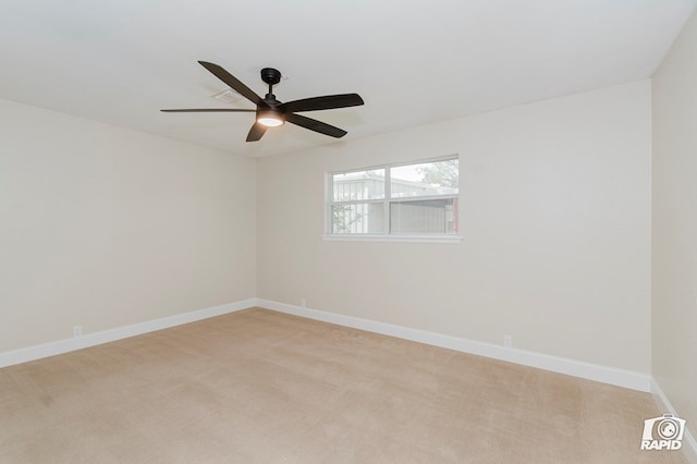 3201 Reo Dr, Midland, TX 79705 - unfurnished room with light colored carpet and ceiling fan