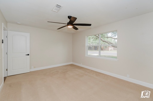 3201 Reo Dr, Midland, TX 79705 - spare room featuring ceiling fan and light carpet