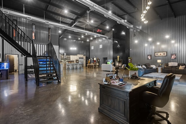 3398 SE 3000, Andrews, TX 79714 - common area featuring a towering ceiling and stairway