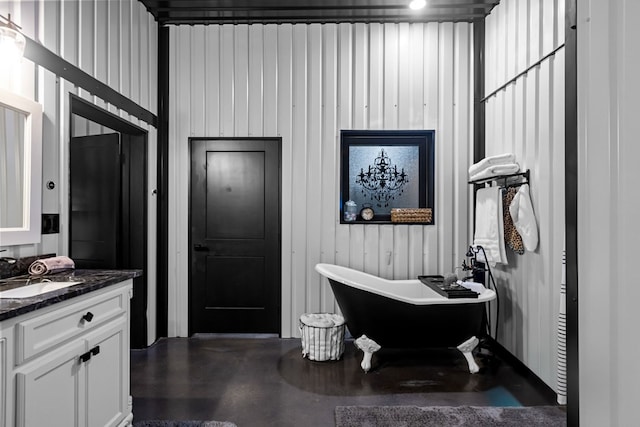 3398 SE 3000, Andrews, TX 79714 - full bathroom featuring vanity and a freestanding bath