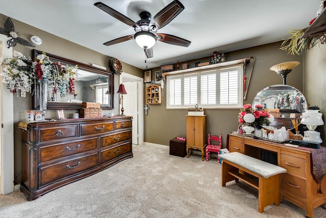 2919 Kirkwood Dr, Odessa, TX 79762 - carpeted bedroom featuring multiple windows and ceiling fan