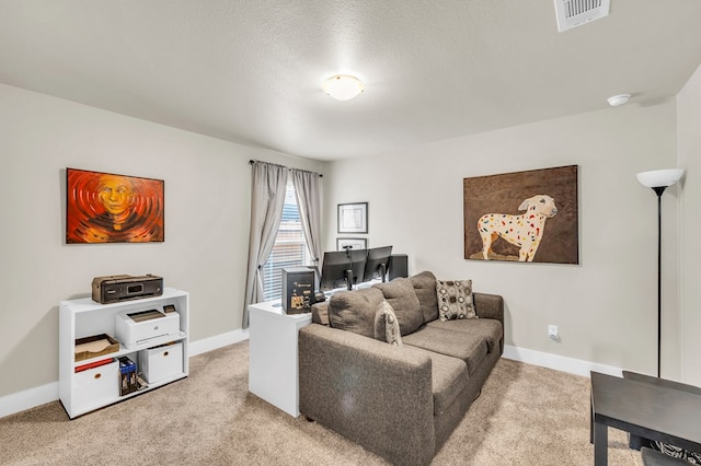 living area with light carpet, a textured ceiling, baseboards, and visible vents