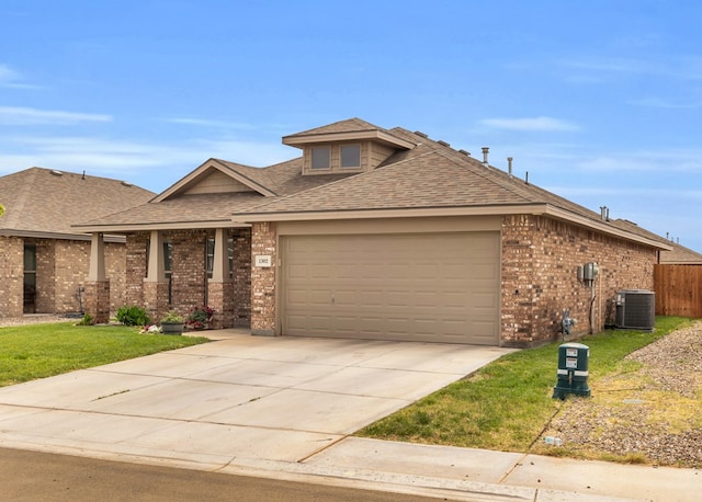 view of front of home featuring an attached garage, brick siding, roof with shingles, and central AC unit