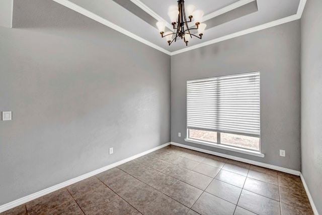 unfurnished room featuring tile patterned flooring, baseboards, a tray ceiling, and a chandelier