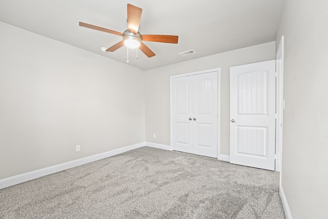8919 Red Cliff Ave, Odessa, TX 79765 - unfurnished bedroom with carpet flooring, a closet, and ceiling fan
