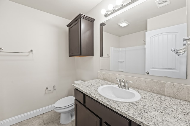 8919 Red Cliff Ave, Odessa, TX 79765 - full bath with vanity, tile patterned floors, and a shower