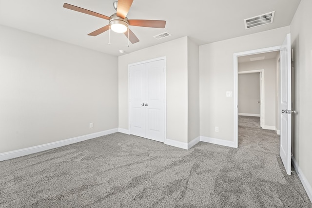 8919 Red Cliff Ave, Odessa, TX 79765 - unfurnished bedroom with carpet flooring, a closet, and a ceiling fan