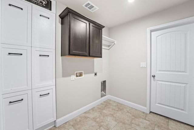 8919 Red Cliff Ave, Odessa, TX 79765 - laundry room featuring electric dryer hookup, hookup for a washing machine, and cabinet space