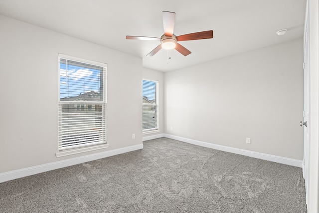 8919 Red Cliff Ave, Odessa, TX 79765 - carpeted empty room with ceiling fan and a smoke detector
