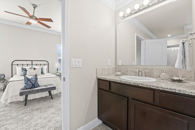 8919 Red Cliff Ave, Odessa, TX 79765 - bathroom featuring crown molding, vanity, and a ceiling fan