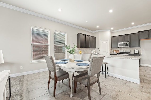 8919 Red Cliff Ave, Odessa, TX 79765 - dining area with ornamental molding, recessed lighting, and light tile patterned floors
