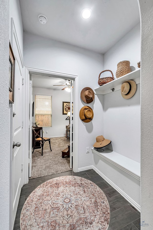 7016 Spur Ranch Rd, Odessa, TX 79765 - mudroom with dark wood-style flooring and ceiling fan