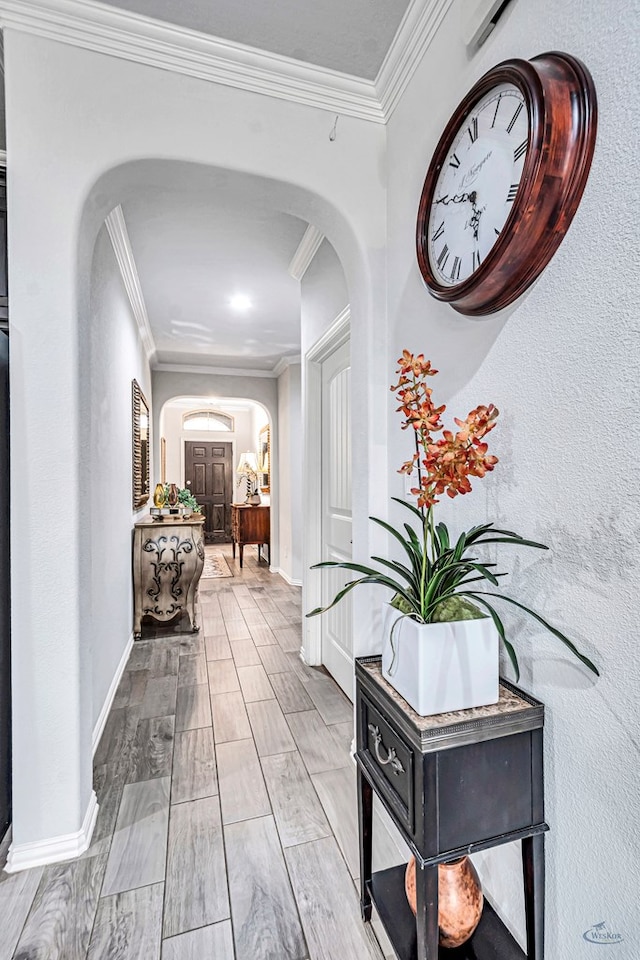 7016 Spur Ranch Rd, Odessa, TX 79765 - corridor with arched walkways and crown molding