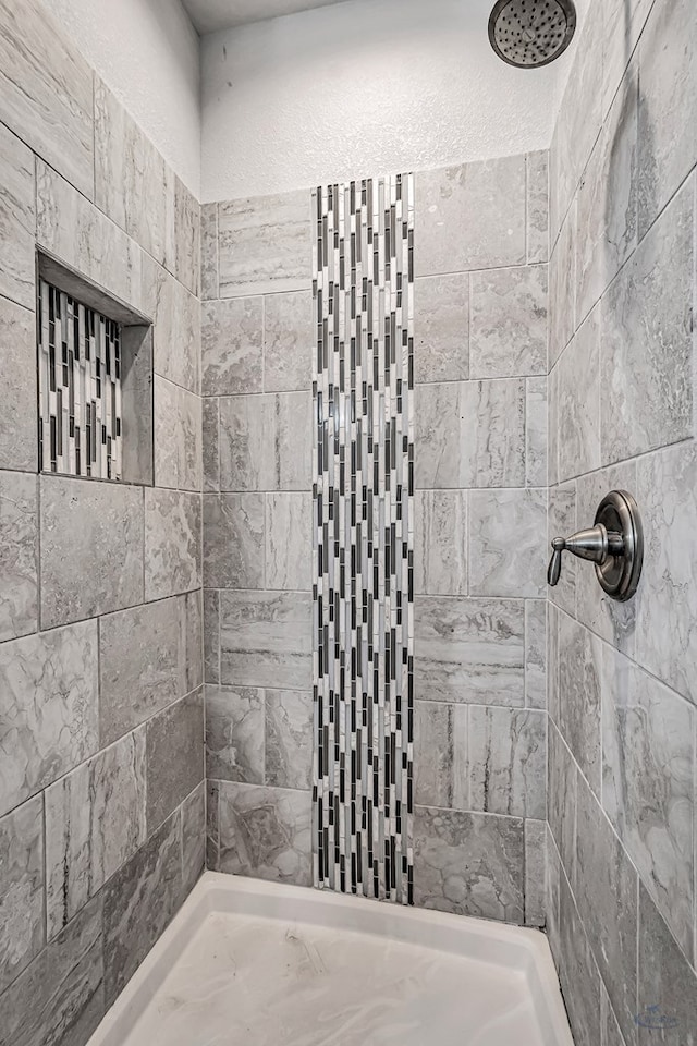 7016 Spur Ranch Rd, Odessa, TX 79765 - full bathroom with tiled shower