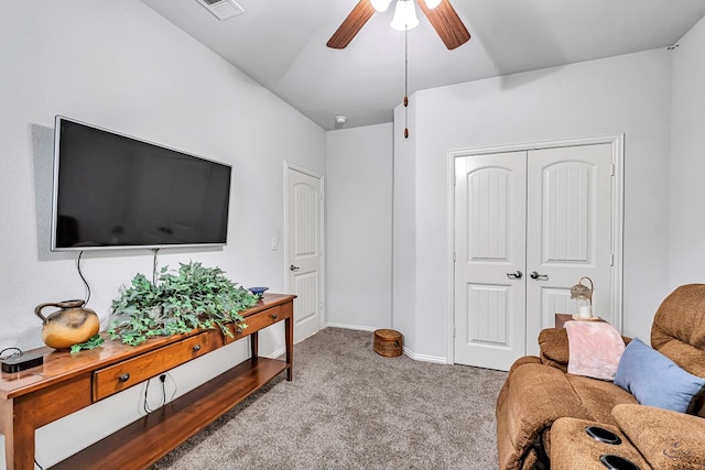 7016 Spur Ranch Rd, Odessa, TX 79765 - carpeted living area with a ceiling fan and baseboards