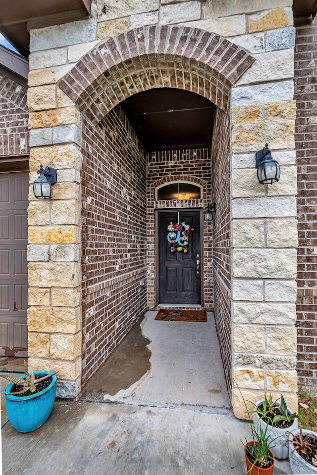 7016 Spur Ranch Rd, Odessa, TX 79765 - property entrance with brick siding and stone siding