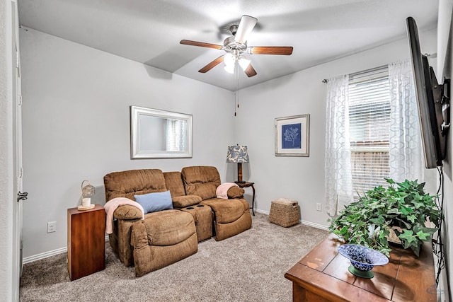 7016 Spur Ranch Rd, Odessa, TX 79765 - carpeted living room with a ceiling fan and baseboards