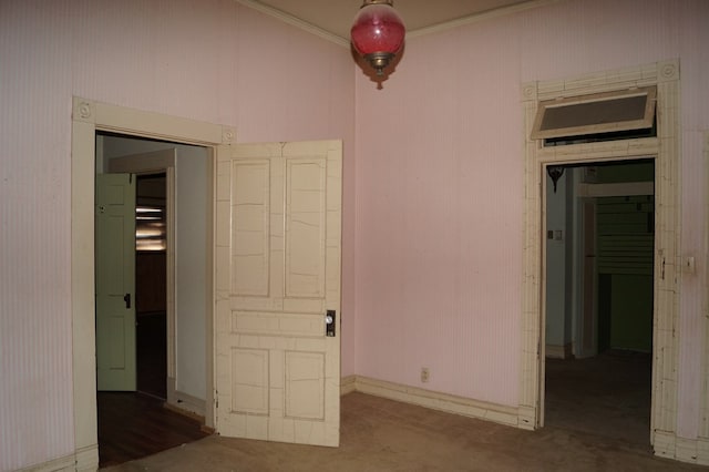 708 W Yukon Rd, Odessa, TX 79764 - unfurnished bedroom featuring carpet, crown molding, and baseboards