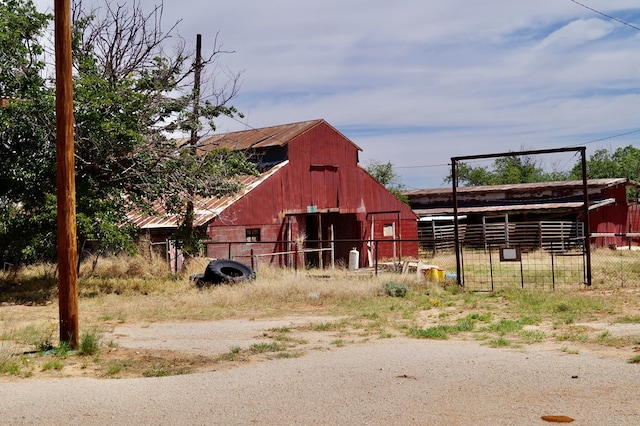 708 W Yukon Rd, Odessa, TX 79764 - view of barn with fence