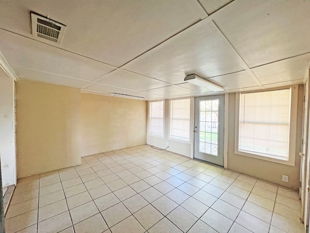 view of tiled spare room