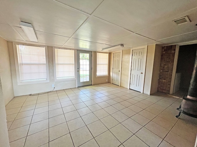 spare room with light tile patterned floors