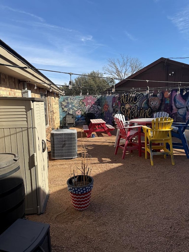 view of yard featuring central AC unit