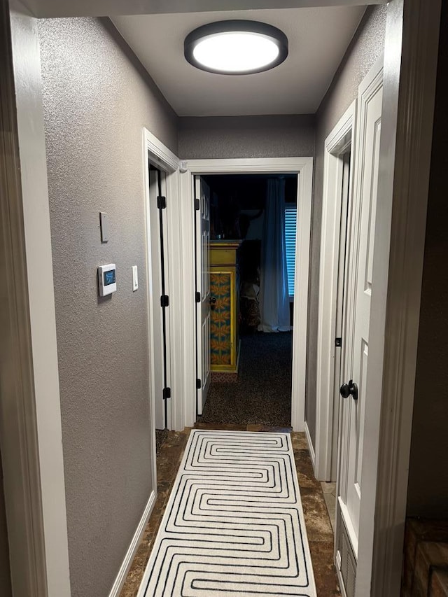 bathroom with tile patterned flooring and shower / bath combo with shower curtain