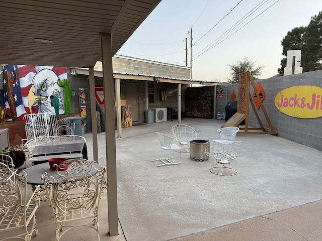 interior space with concrete flooring and a workshop area