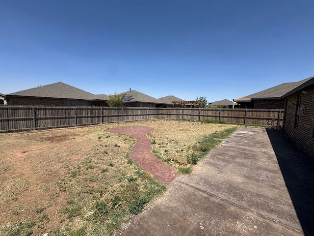 7001 La Escalera Ct, Odessa, TX 79765 - fenced backyard with a patio