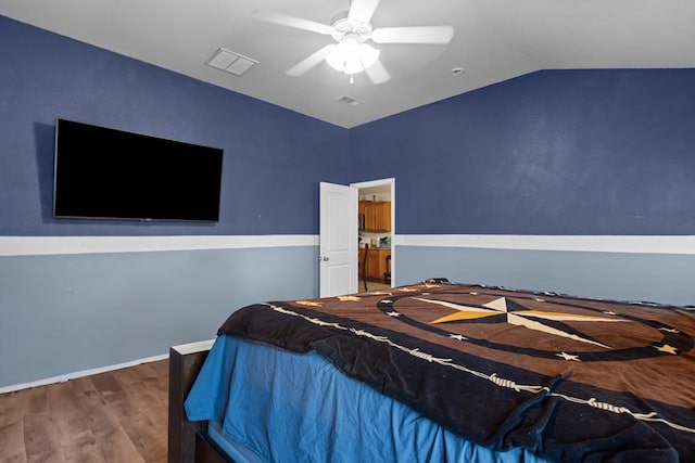 1012 Duke Ave, Odessa, TX 79765 - bedroom featuring vaulted ceiling, wood finished floors, and ceiling fan