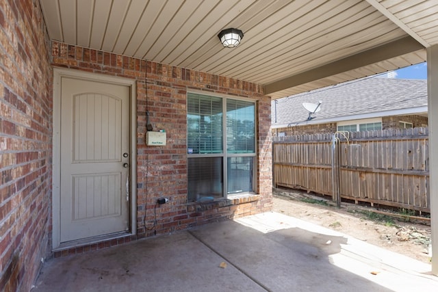 1012 Duke Ave, Odessa, TX 79765 - doorway to property featuring brick siding