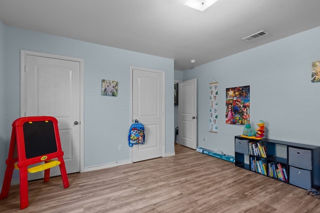 1012 Duke Ave, Odessa, TX 79765 - playroom with wood finished floors and baseboards