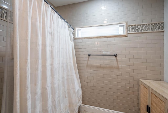 7604 Keyhaven St, Odessa, TX 79765 - full bathroom featuring a tile shower
