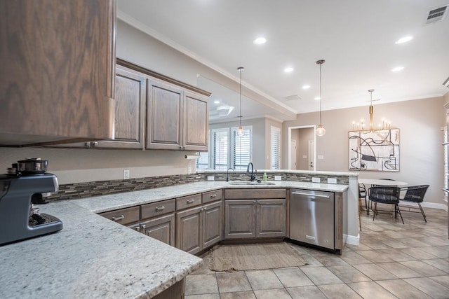 7604 Keyhaven St, Odessa, TX 79765 - kitchen featuring dishwasher, crown molding, a peninsula, recessed lighting, and a chandelier