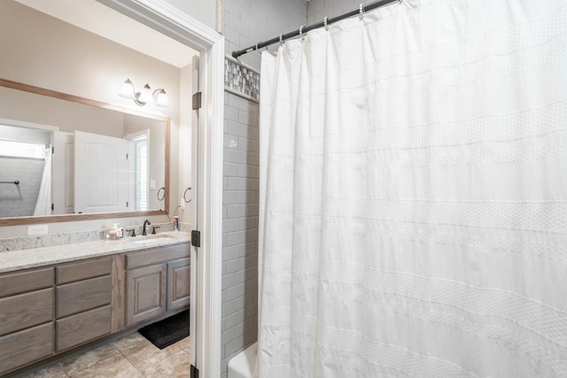 7604 Keyhaven St, Odessa, TX 79765 - bathroom featuring vanity and shower / bath combination with curtain