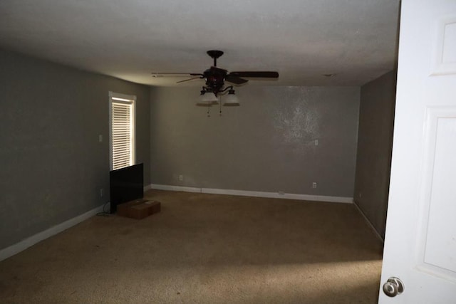 1642 S Plum Ave, Pecos, TX 79772 - carpeted empty room with a ceiling fan and baseboards