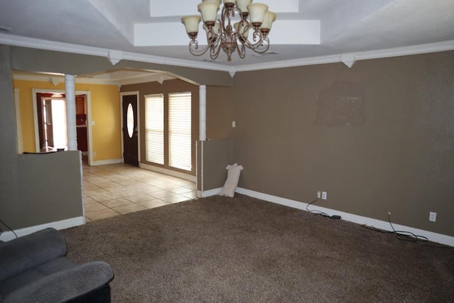 1642 S Plum Ave, Pecos, TX 79772 - unfurnished living room with a chandelier, light tile patterned floors, baseboards, light colored carpet, and ornamental molding