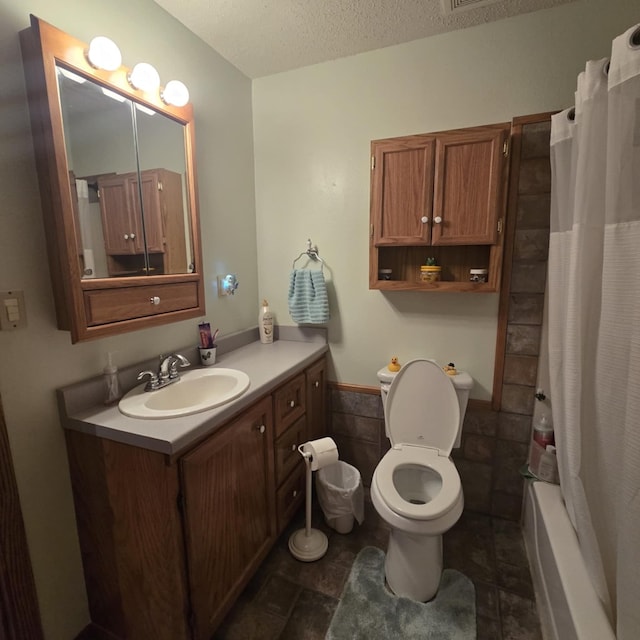 9935 W Yukon Rd, Odessa, TX 79764 - bathroom with vanity, a textured ceiling, wainscoting, tile patterned floors, and shower / bathtub combination with curtain