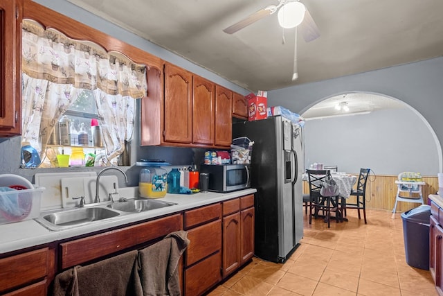 kitchen with ceiling fan, light tile patterned floors, sink, and appliances with stainless steel finishes