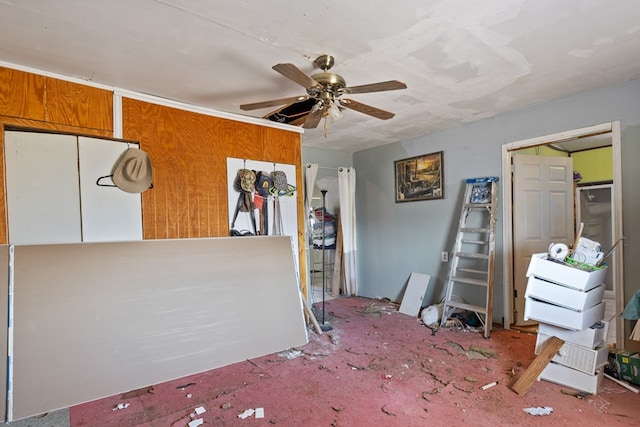 unfurnished bedroom with carpet floors and ceiling fan