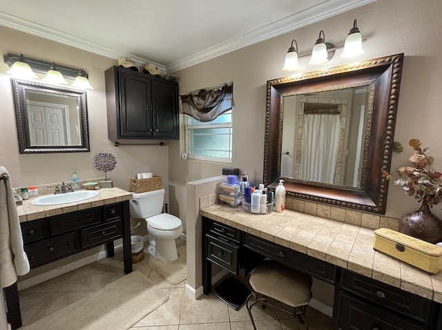 1401 S Franklin Ave, Monahans, TX 79756 - bathroom featuring ornamental molding, vanity, and tile patterned flooring
