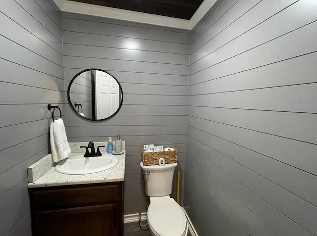 1401 S Franklin Ave, Monahans, TX 79756 - half bath with vanity and wood walls