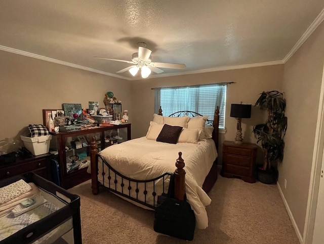 1401 S Franklin Ave, Monahans, TX 79756 - bedroom featuring carpet floors, ornamental molding, and ceiling fan