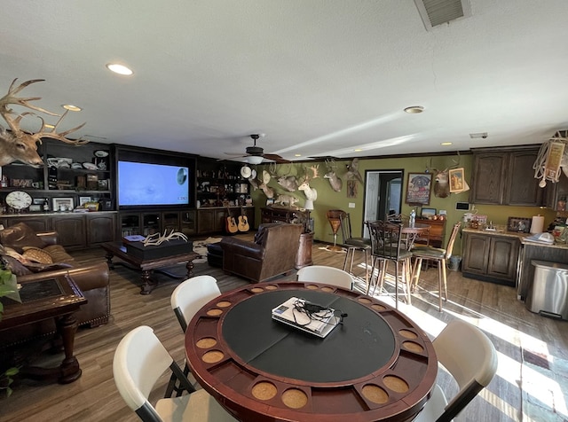 1401 S Franklin Ave, Monahans, TX 79756 - dining area featuring a ceiling fan, recessed lighting, and light wood-style flooring
