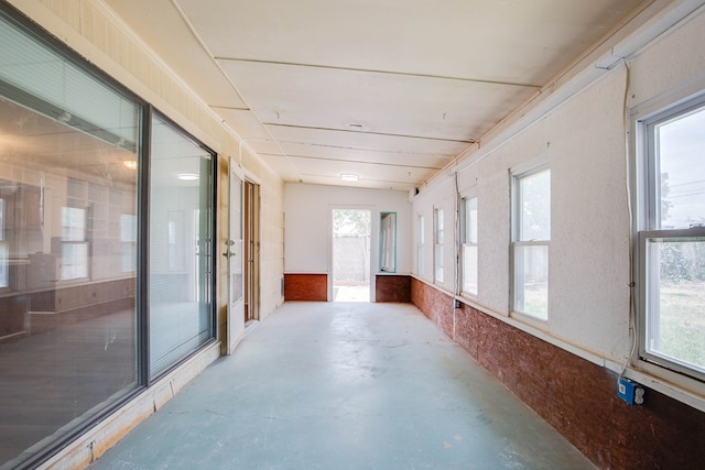 2802 Windsor Dr, Odessa, TX 79762 - unfurnished sunroom featuring concrete floors and healthy amount of natural light
