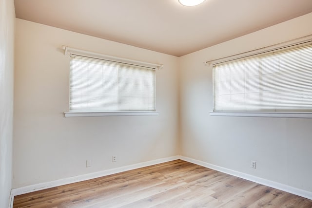 2802 Windsor Dr, Odessa, TX 79762 - unfurnished room featuring wood finished floors and baseboards