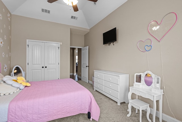 1805 Bourbon St, Odessa, TX 79765 - bedroom featuring light carpet, vaulted ceiling, a closet, and a ceiling fan