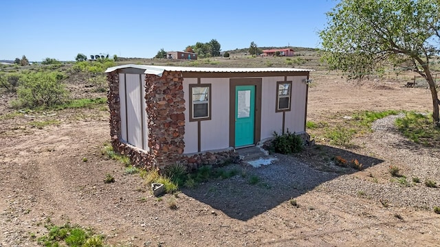 504 San Juan Dr, Fort Davis, TX 79734 - view of outbuilding with entry steps