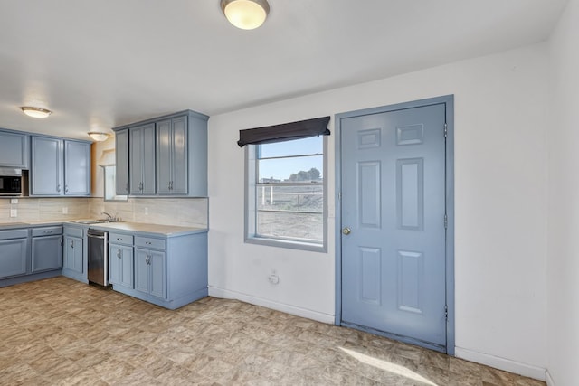 504 San Juan Dr, Fort Davis, TX 79734 - kitchen featuring light countertops, tasteful backsplash, and dishwasher