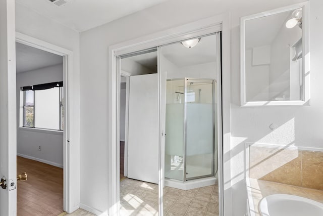 504 San Juan Dr, Fort Davis, TX 79734 - bathroom with a stall shower and baseboards